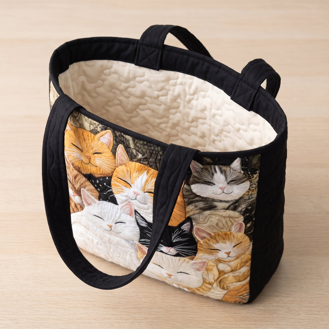 Bolso Artesanal Acolchado — Gatitos Dormidos: abierto, mostrando el forro acolchado en crema liso